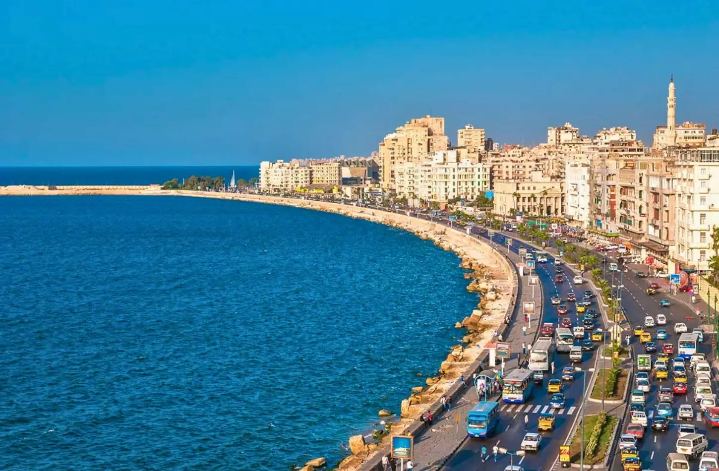The scenic Mediterranean waterfront and coastal cityscape of Alexandria, Egypt, perfect for an Alexandria Travel Guide.