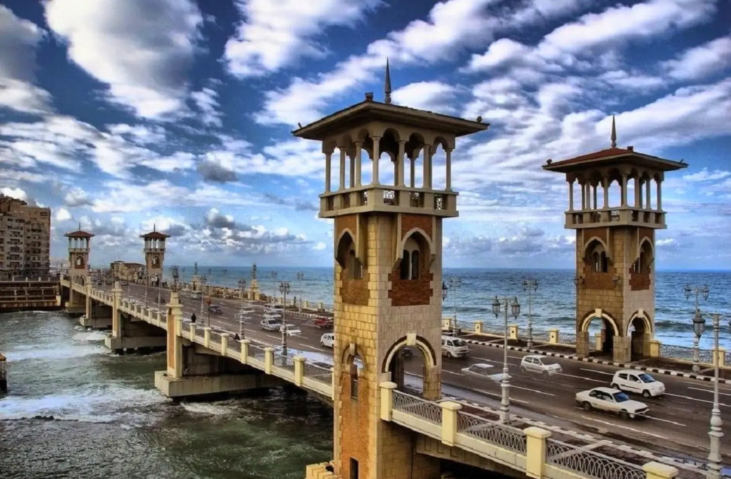 The iconic towers of Stanley Bridge overlooking the Mediterranean Sea, featured in our Alexandria Travel Guide.
