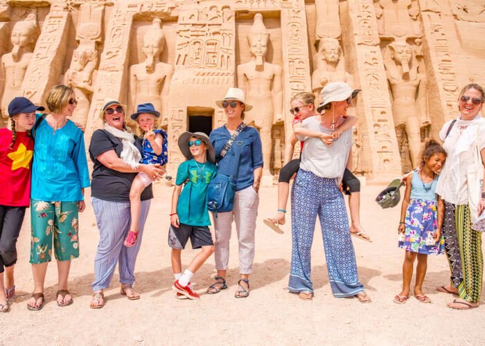 A wonderful picture of a family in front of Abu Simbel Temple