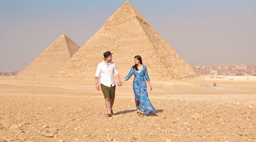 A wonderful picture of the couple in front of the pyramids
