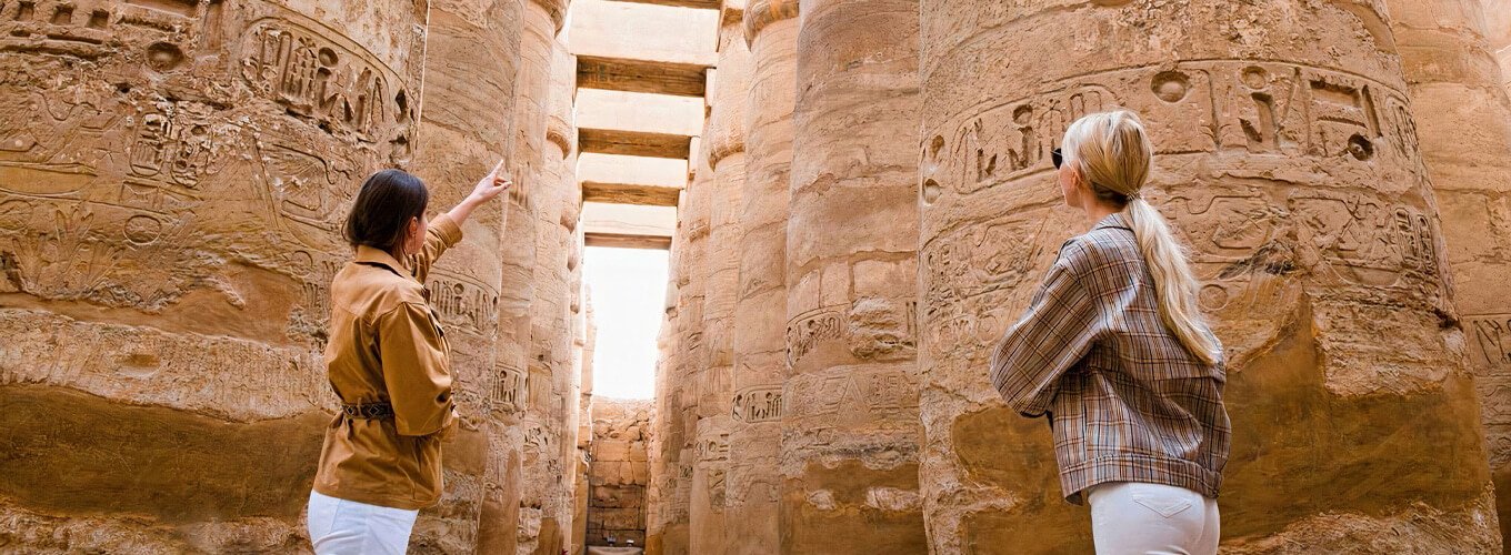 A wonderful picture of two women at Karnak Temple