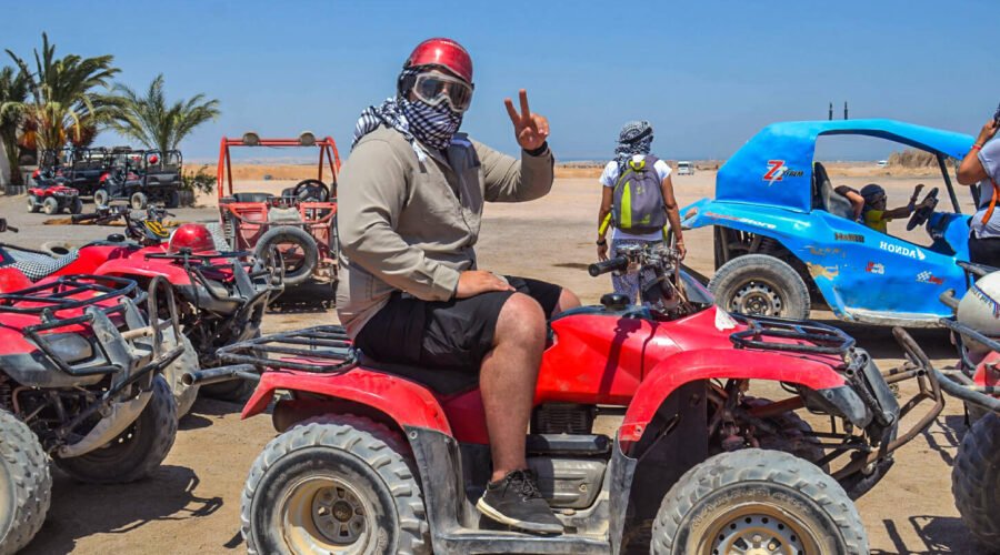 A wonderful shot of a person riding a quad bike from one of the safari trips in Hurghada