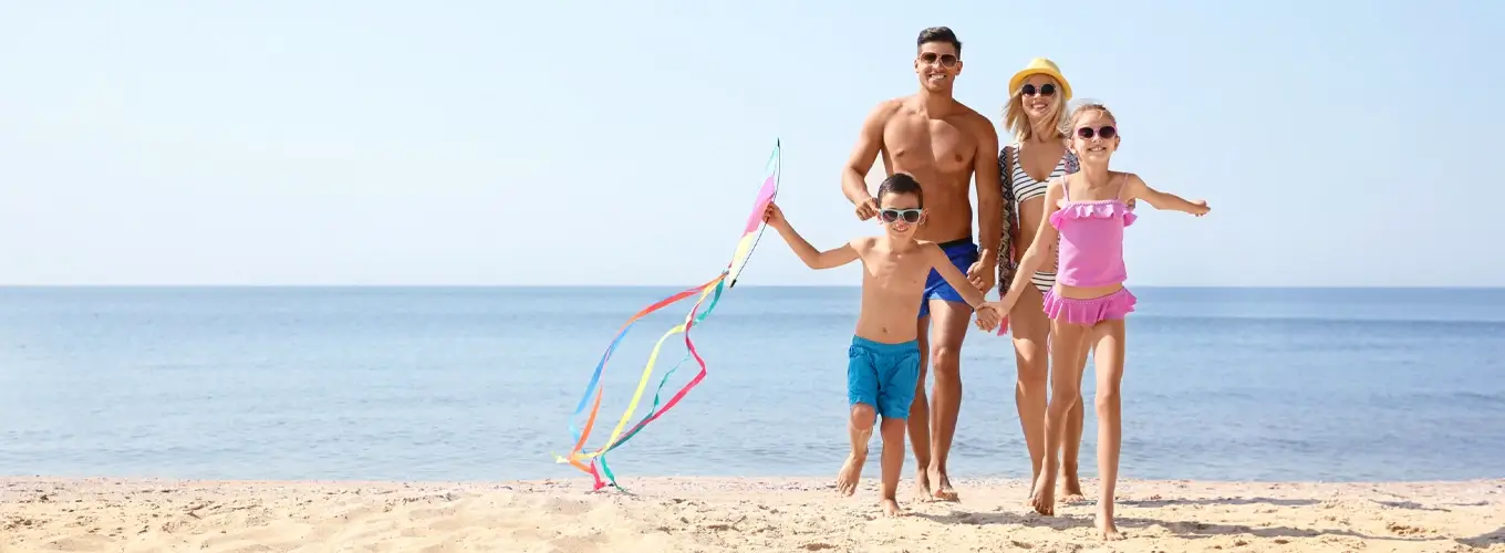 A-family-flying-a-colorful-kite-together-on-a-sunny-sandy-beach Things to Do in Sharm El Sheikh